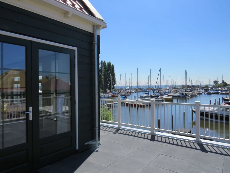 Water, Sky, Boat, Watercraft, Shade, Window, Building, Door, Real Estate, City