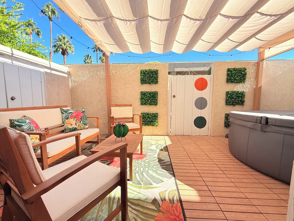 Cute back patio to relax and soak!