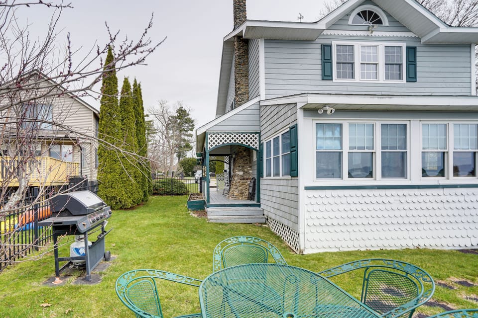 Exterior | Fenced Backyard | Porch Swing | Gas Grill