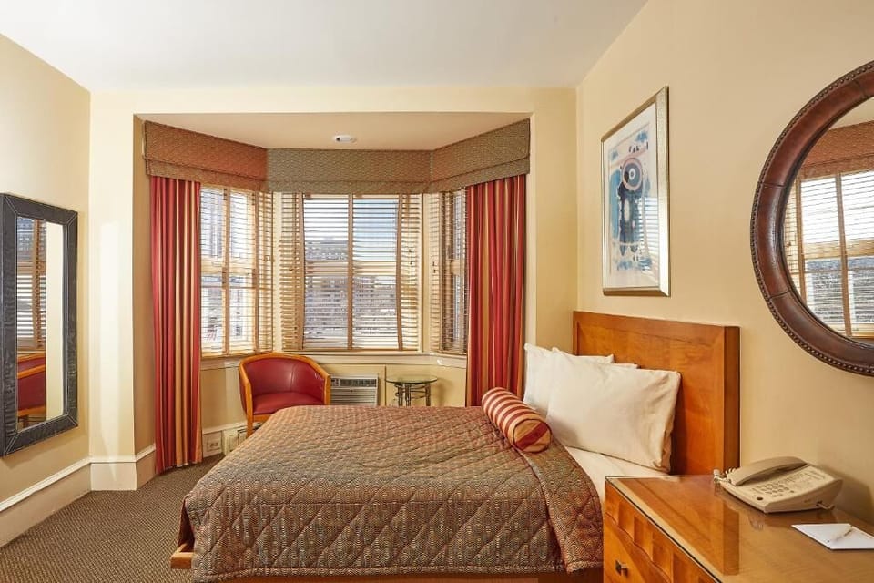 Wake up to soft daylight filtering through charming bay windows.