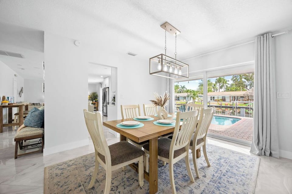 Dining Room: Delight in waterfront views as you enjoy meals in this elegant, sunlit space!