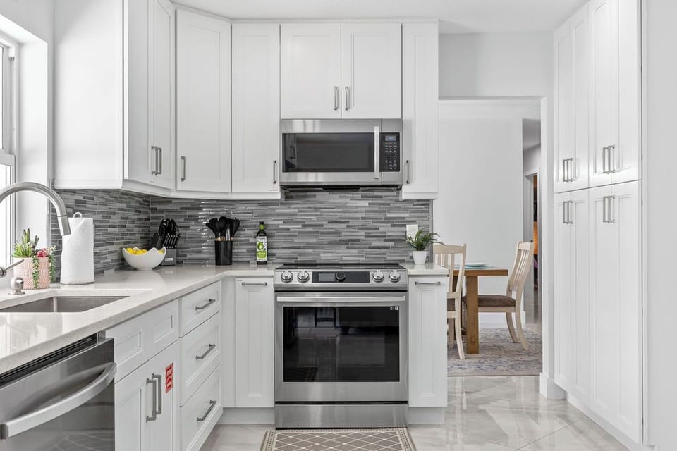 Modern Kitchen: Sleek appliances and elegant details invite culinary adventures in style!