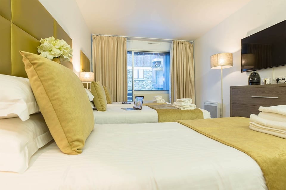 Drift to sleep in this plush bed.