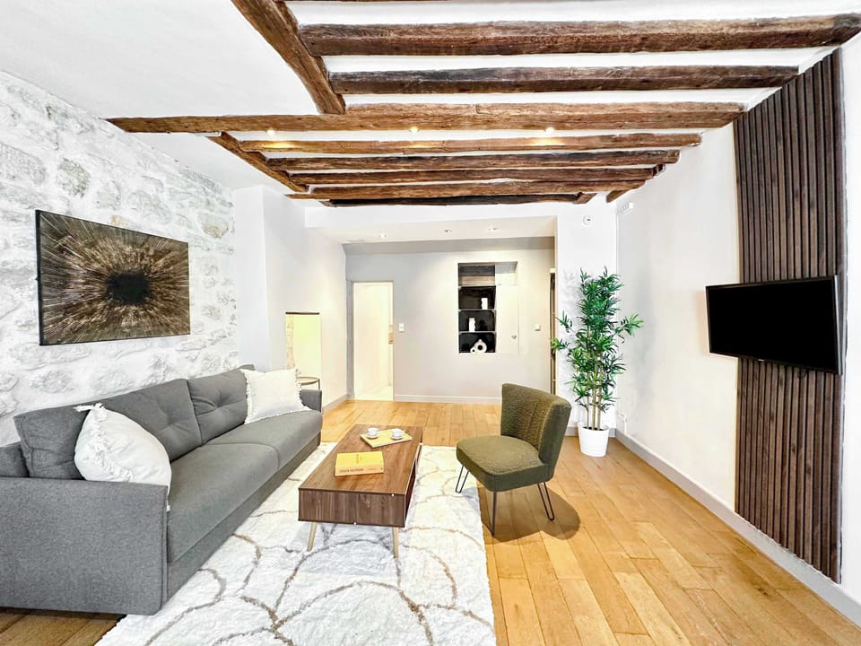 A warm and airy living room with a double sofa bed