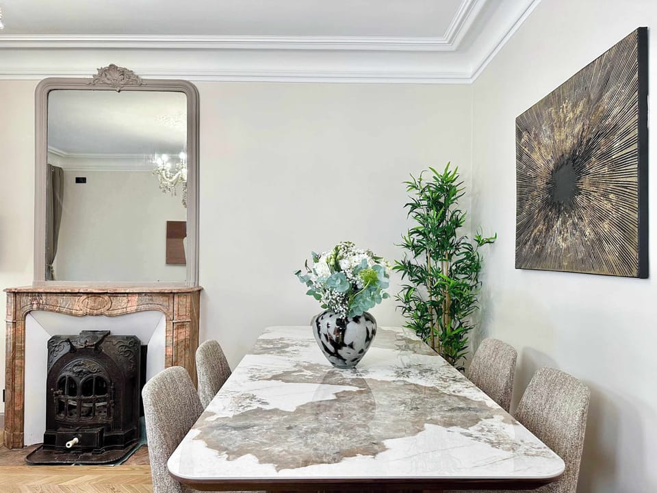 The living room table can be used as a dining table or for working space.