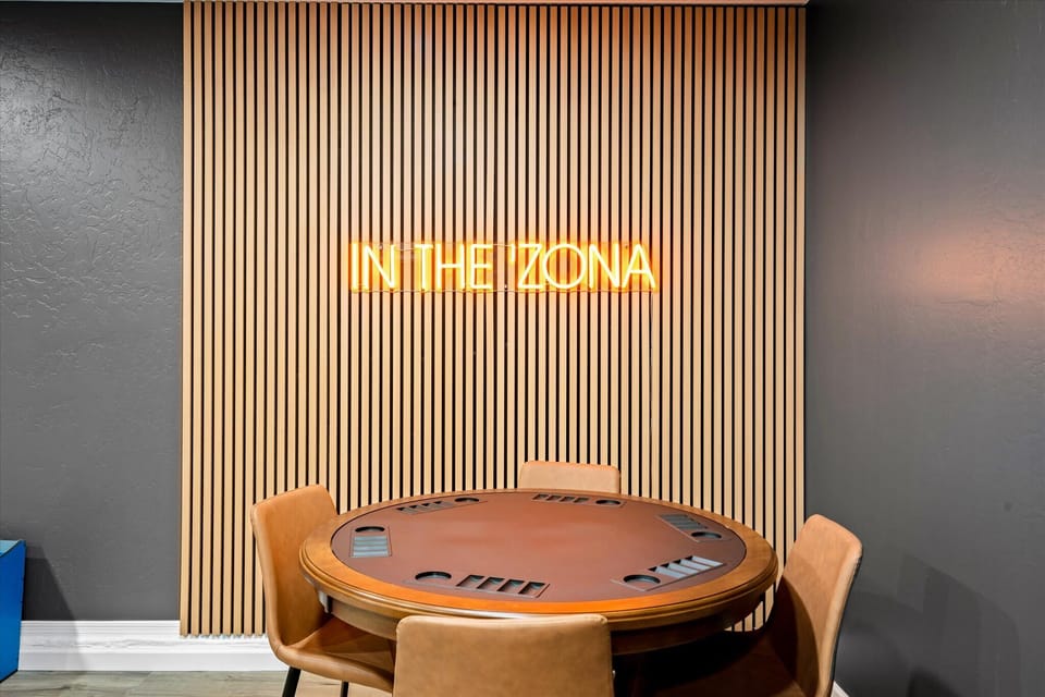 Deal yourself in! Our poker table is ready for game night and friendly competition.