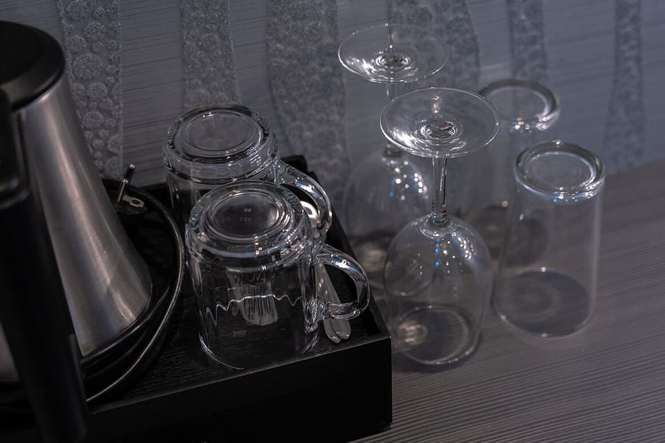 Sophisticated glassware and carafe set ready to enhance your dining experience or evening relaxation.
