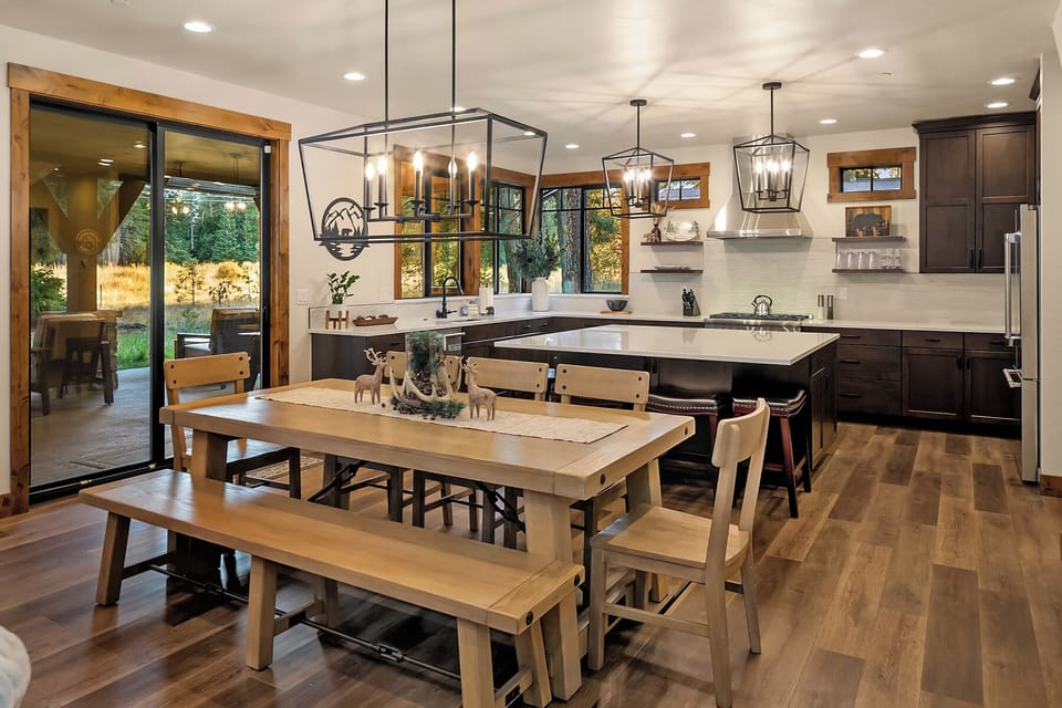 Snowbeary Lodge: - Dining table for 8 and additional seating for 4 at the kitchen island.