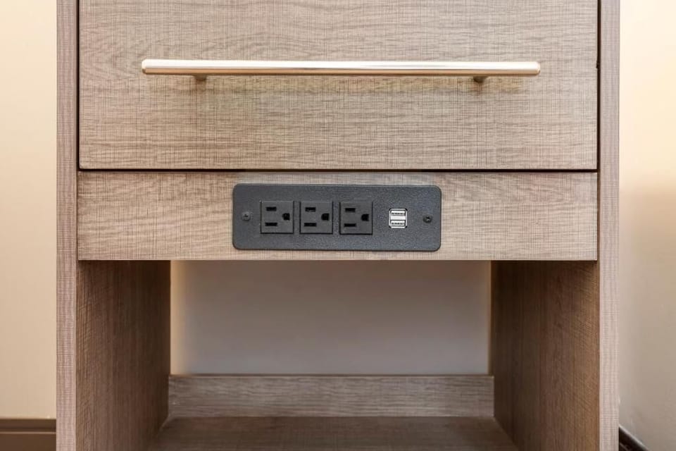 Recharge effortlessly with bedside outlets and convenient USB charging.