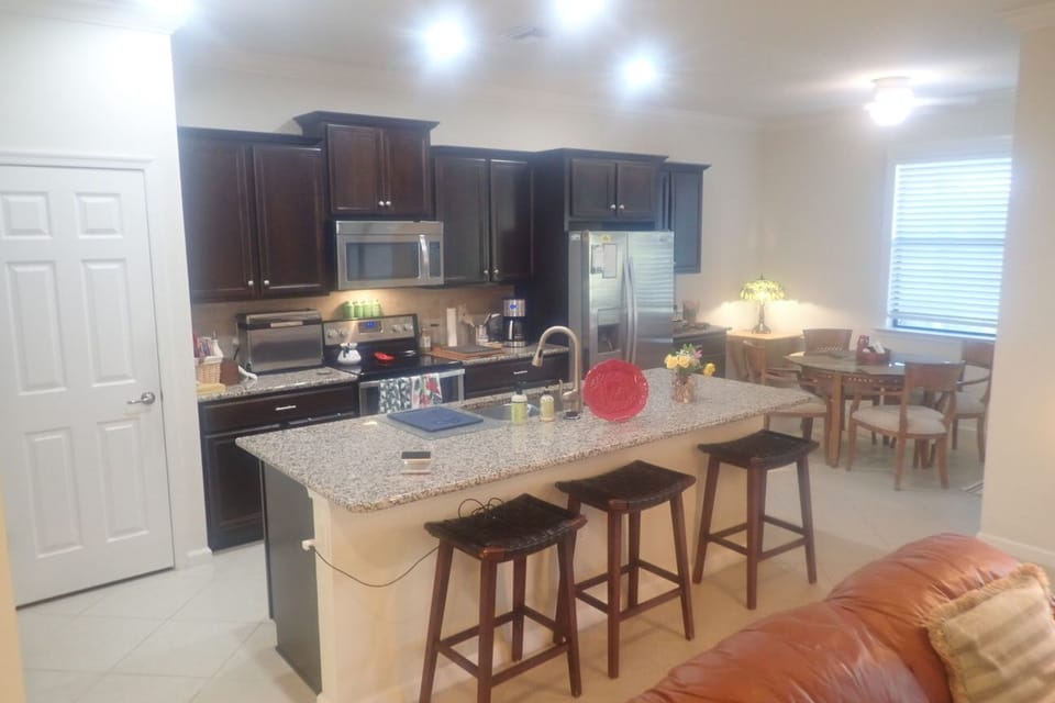 Kitchen,  with island,  stainless steel applicances, dishwasher