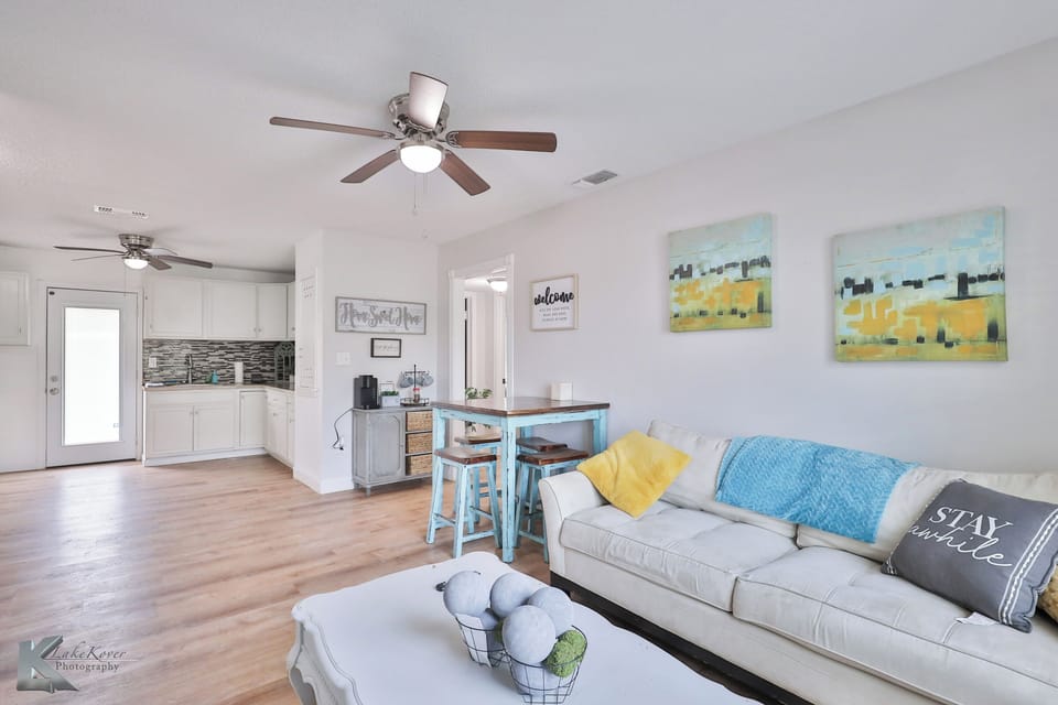 Enjoy an open floor plan with a bright living room, kitchen and dining area.