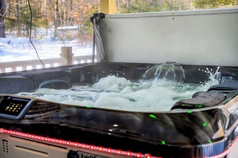 8-person hot tub spa oasis under a gazebo and the stars. Unwind in bubbly bliss surrounded by nature—perfect for stargazing, spotting shooting stars, and even the Northern Lights. Just steps from two fire pits for s’mores and fireside chats.