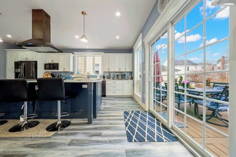 Award-winning "Open Concept Design" brand new custom built in 2024 top-tier elegant finishes—perfect for entertaining -enjoying the family. Gaze out over floor-to-ceiling windows, a striking linear fireplace, + private garden w/hot tub spa+fire pit!