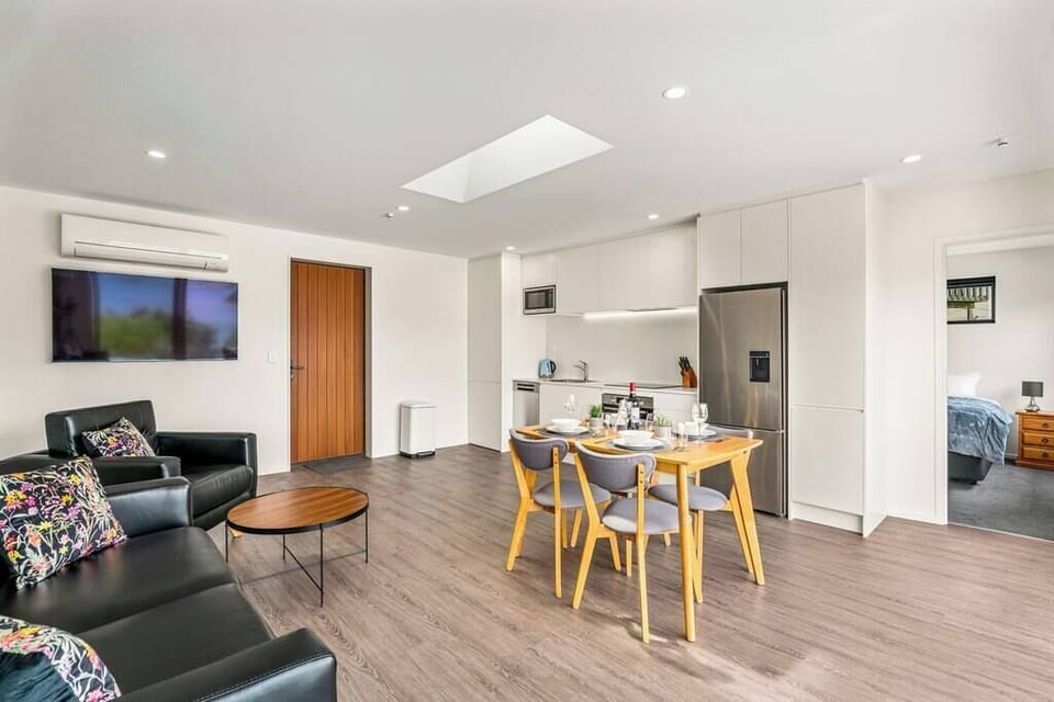 A very spacious open plan design, with a large 60 inch smart tv and air conditioner (heat pump) and skylight.