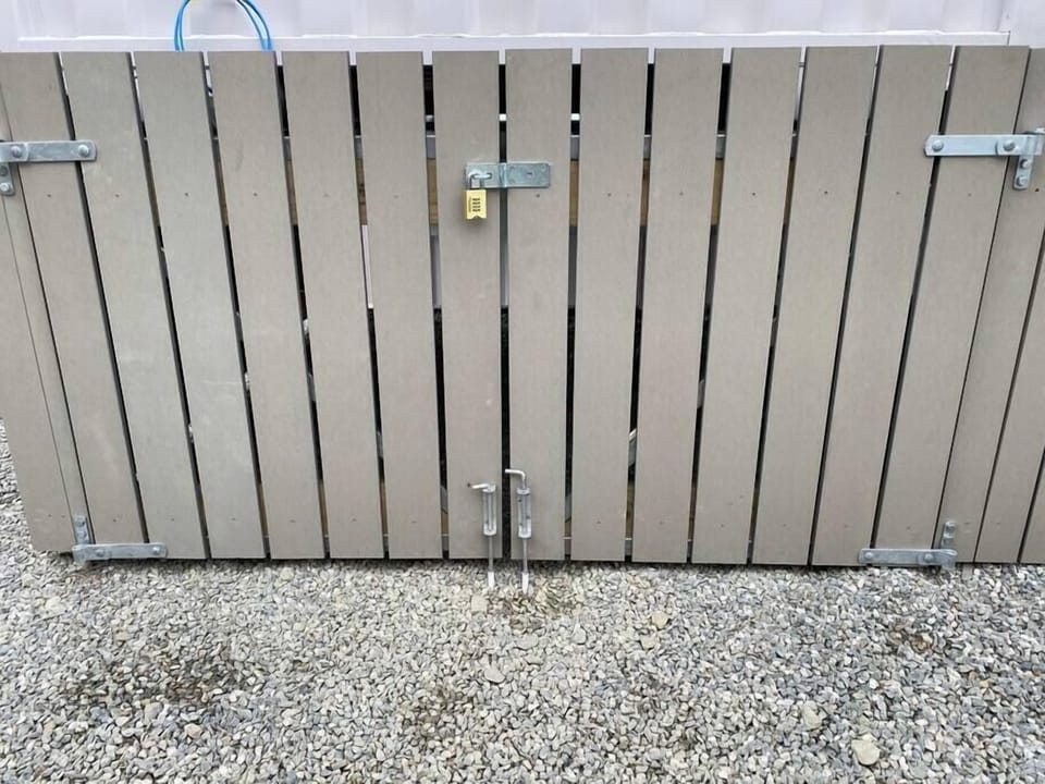 Lockable storage is provided.  Perfect for storing mountain bikes, skis, snowboards, etc