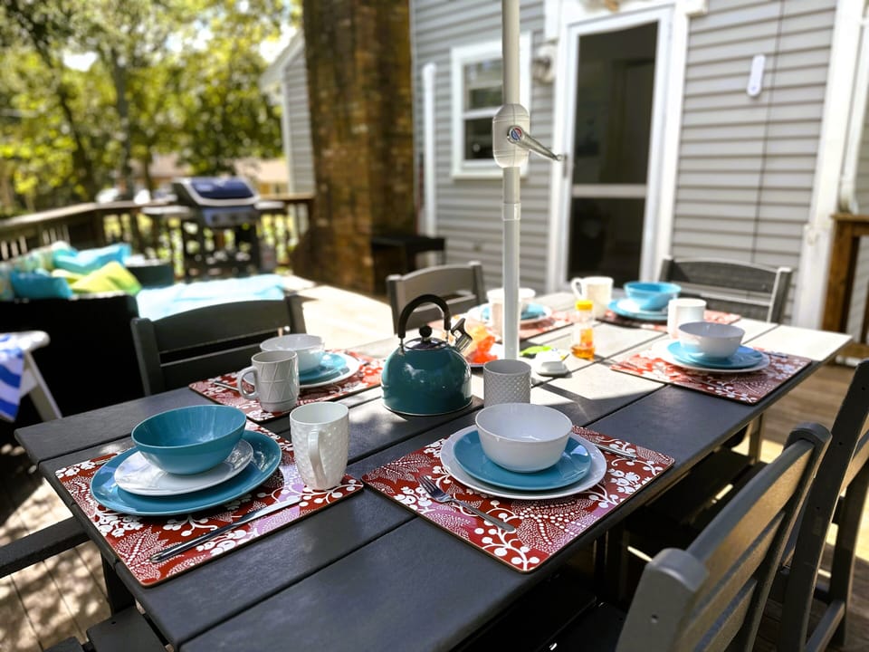 Outdoor dining space and gas grill