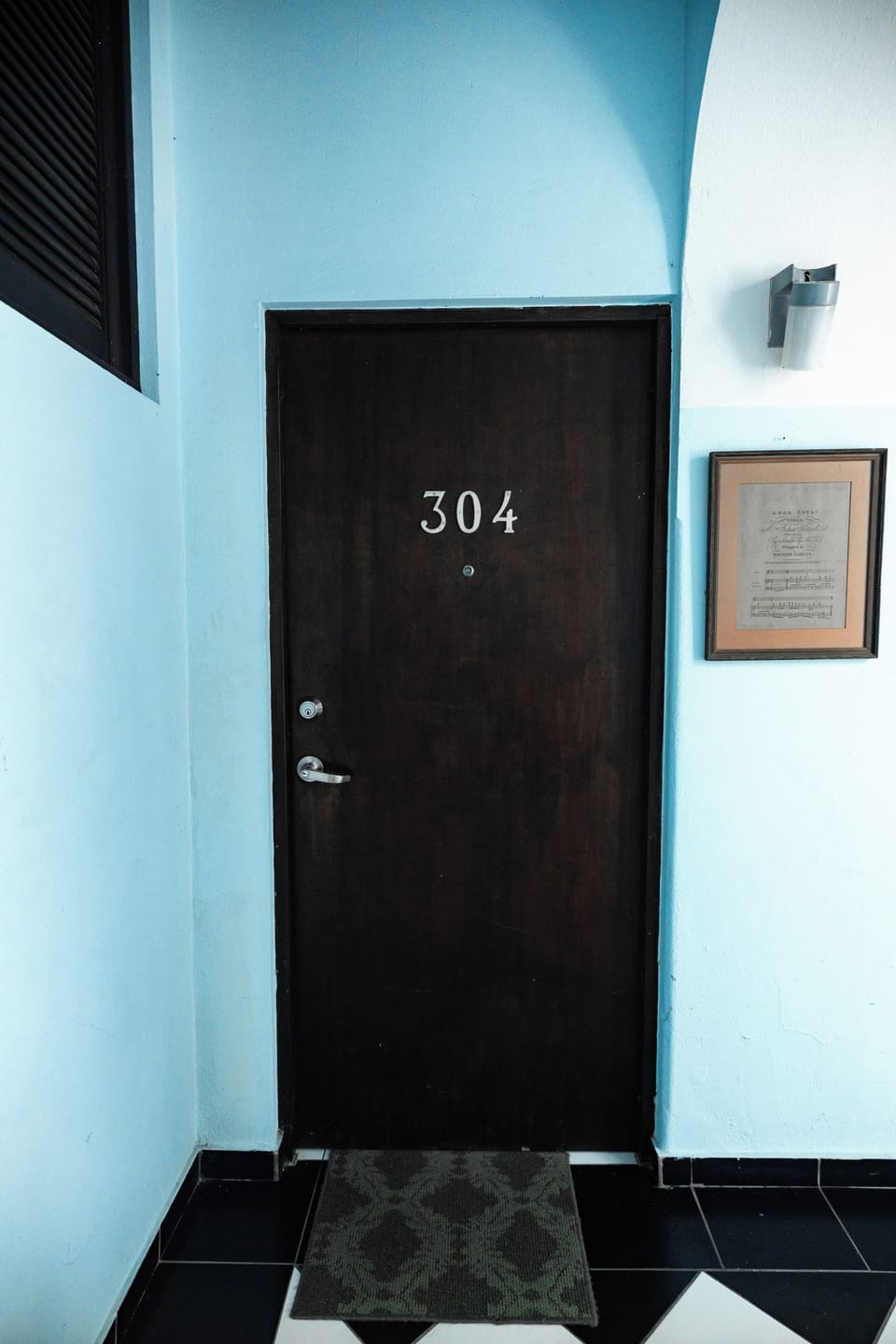 Your private apartment awaits behind this door, marked with the number 304