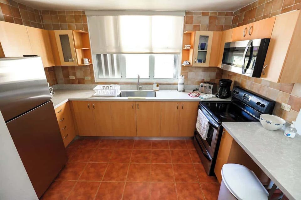 The kitchen is the home's heart, where flavors come alive.
