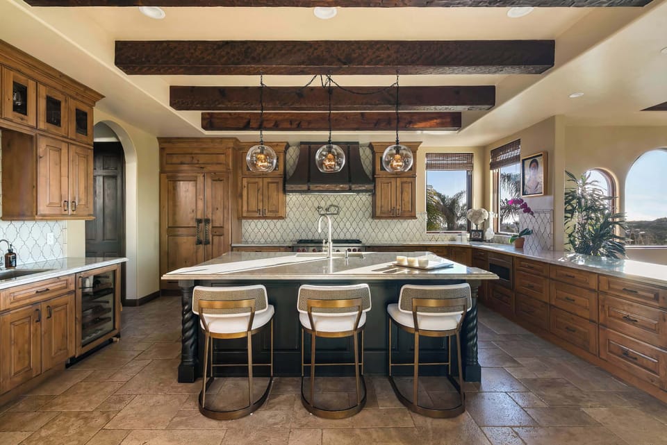 The kitchen island with pendant lighting 