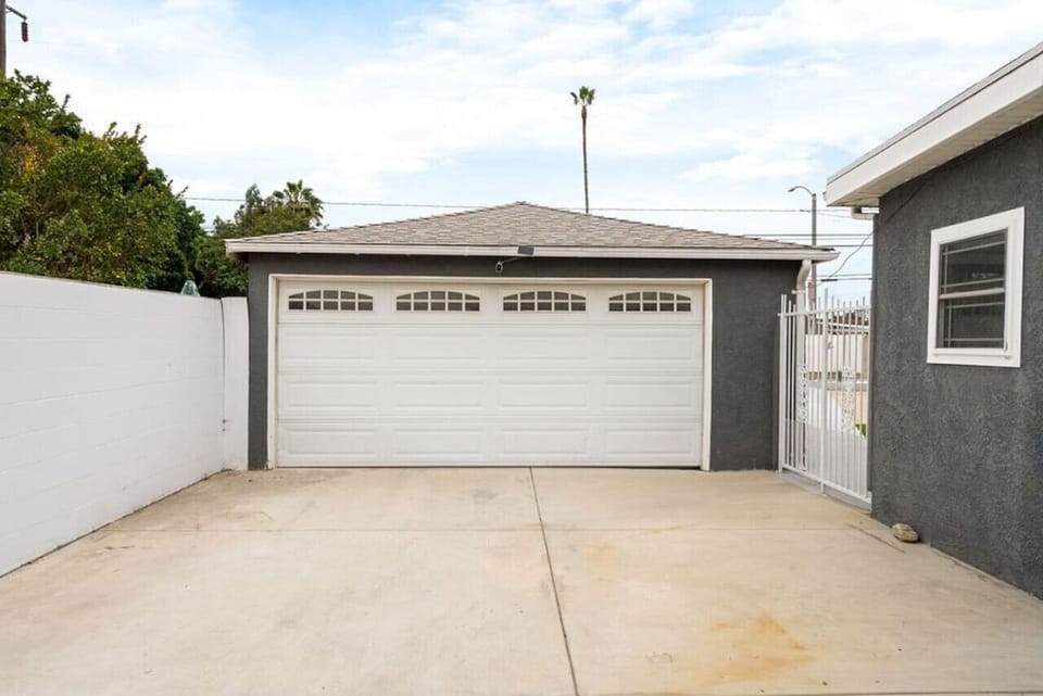Conveniently located driveway with easy access to the garage, offering ample space for parking and quick entry to the home