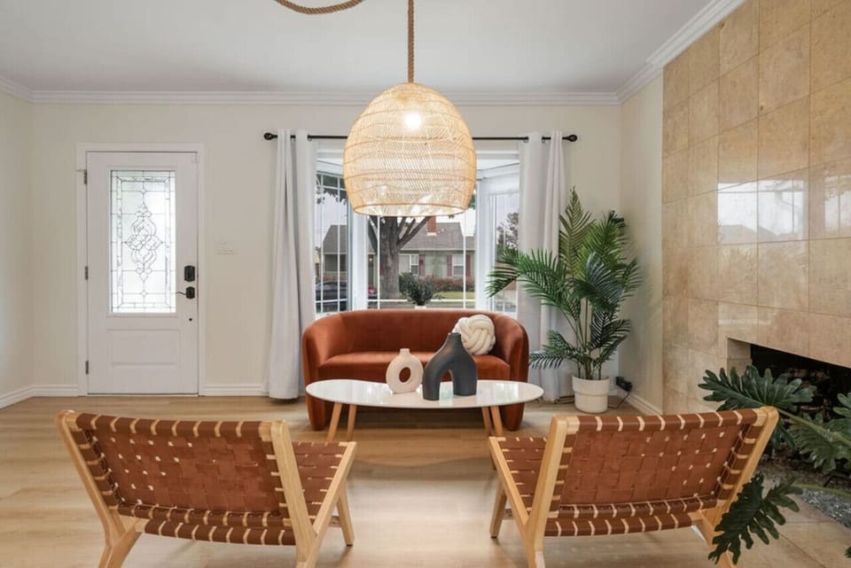Beautiful living room featuring cozy, cute couches, creating a comfortable and stylish space to relax and unwind.