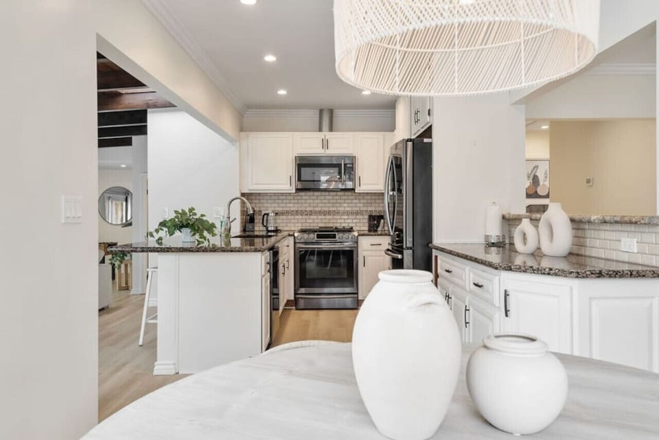 An elegant kitchen with complete cooking supplies, where great meals begin and culinary creativity flows.