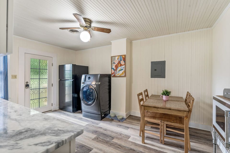 Enjoy modern convenience with a full fridge and sleek LG washer/dryer combo!