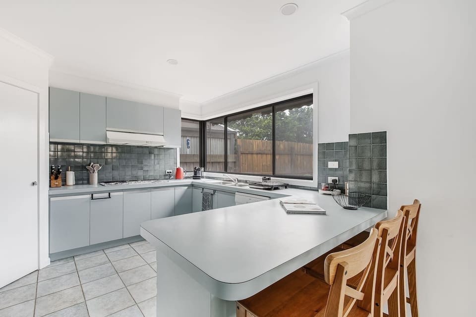 Cook up a feast in the well-equipped kitchen, featuring ample bench space, walk-in pantry and bar seating.
