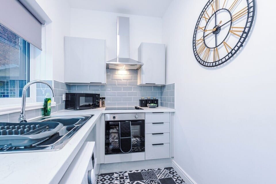 Modern cabinetry and appliances for a polished look.