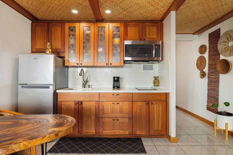 Full kitchen with large fridge and microwave/convection oven