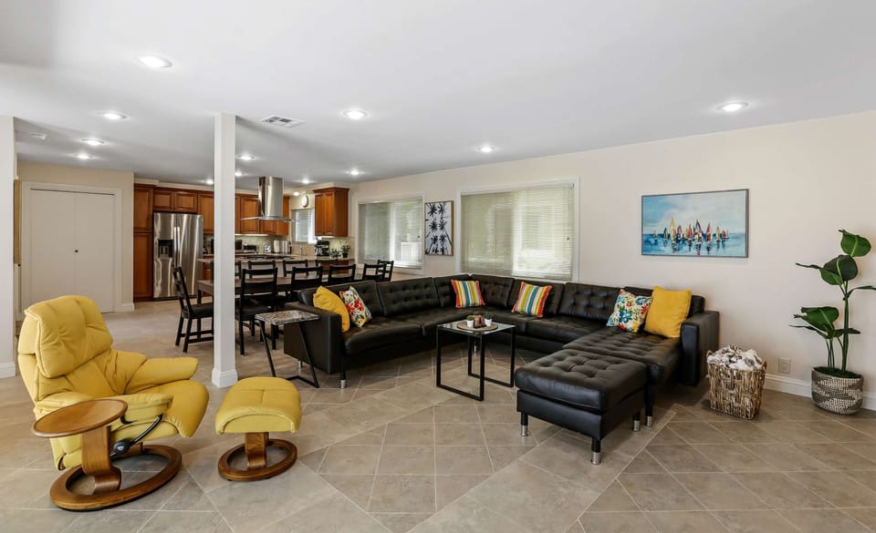 Living room with comfortable seating around a Smart TV (Netflix, Hulu, etc.)