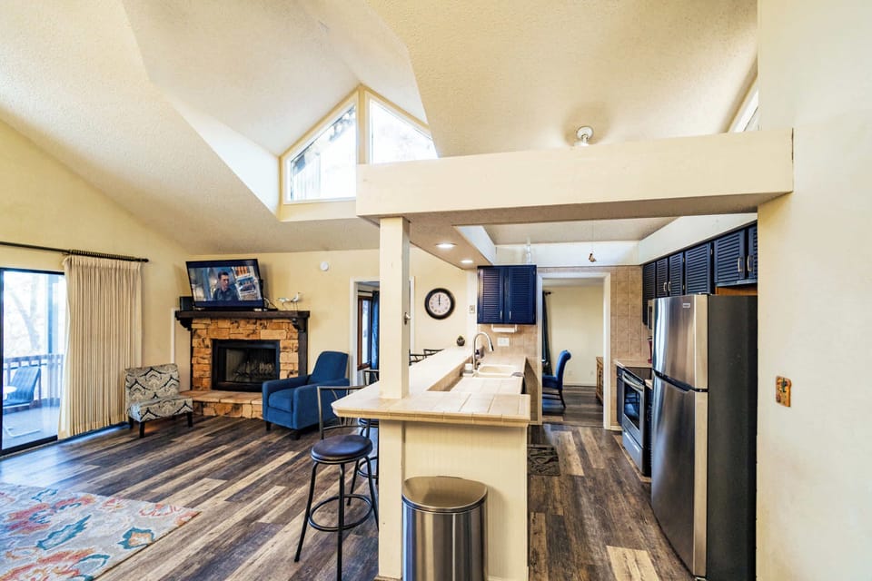 The airy, open kitchen offers ample space & all the comforts of home