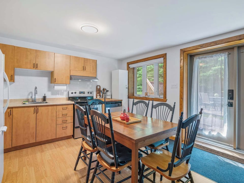     Fully equipped kitchen and dining area perfect for family meals.
