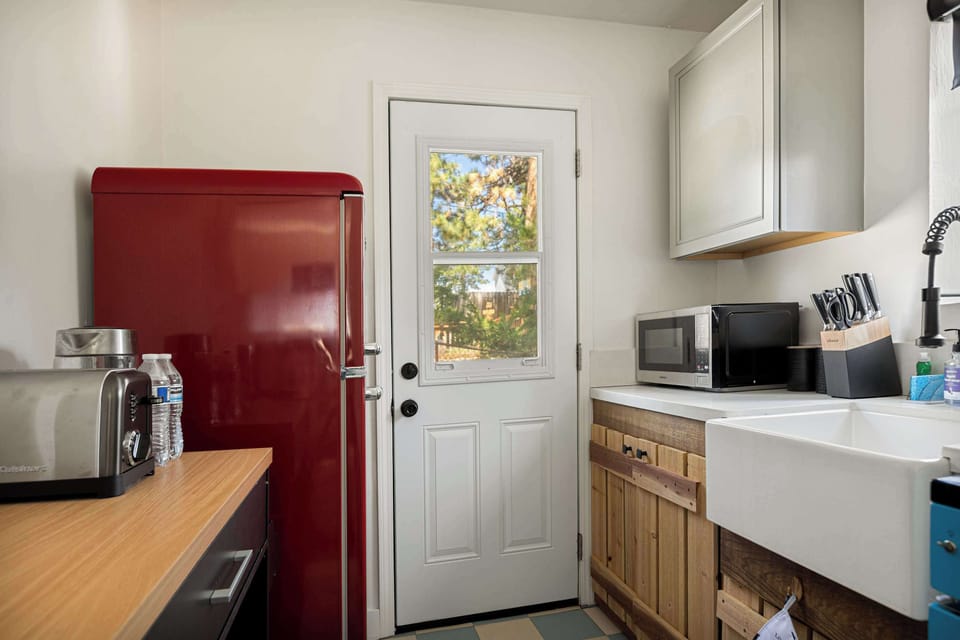 Whip up meals in the fully equipped kitchen with vintage appliances.