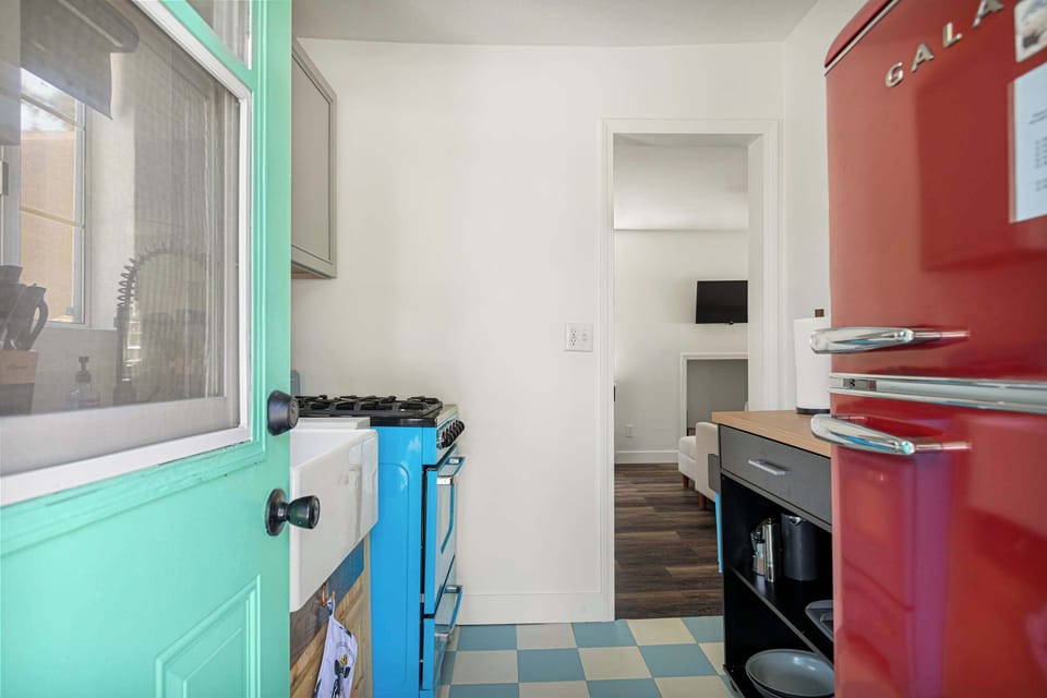 Full kitchen with side door.