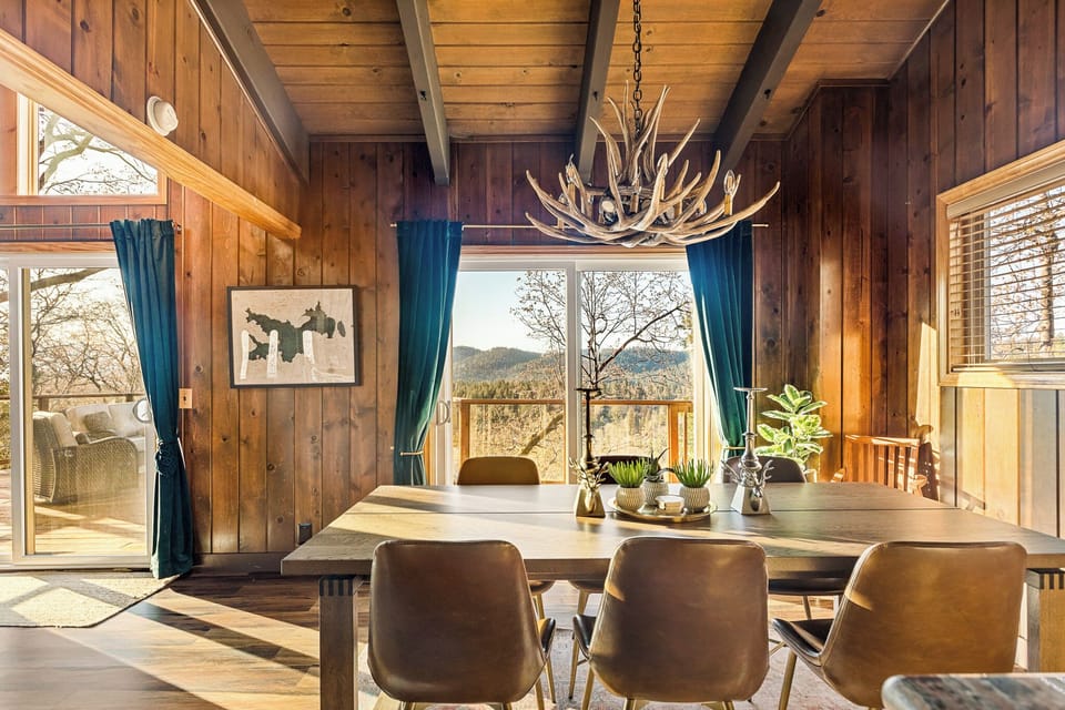Spacious, open Dining Area with seating for 6 and access to the back deck