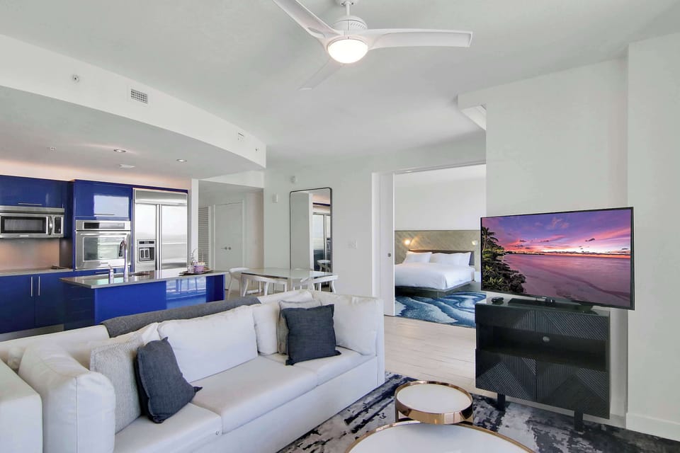 Cozy and spacious living area with TV