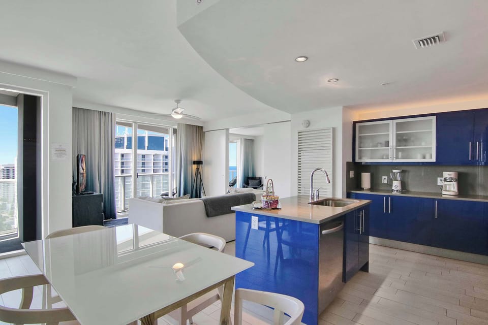 Dining, living, and kitchen area