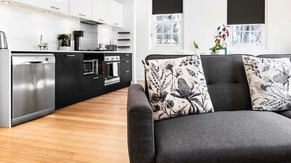 Contemporary interiors blending sleek finishes with everyday comfort