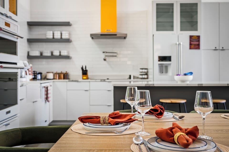 Cook, sip, and enjoy quality time in the modern open kitchen.