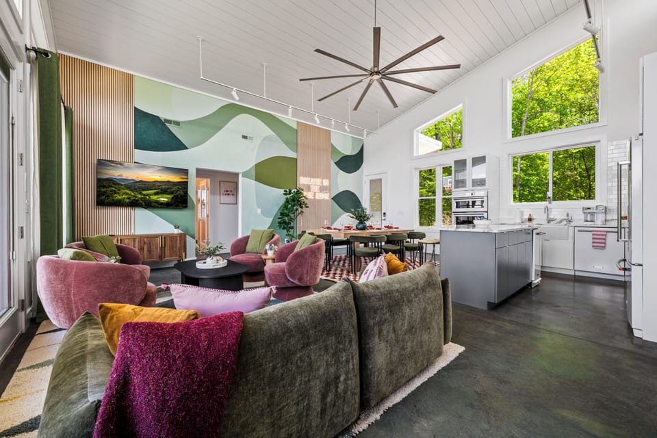 Bright open-concept living made for gathering and relaxing.