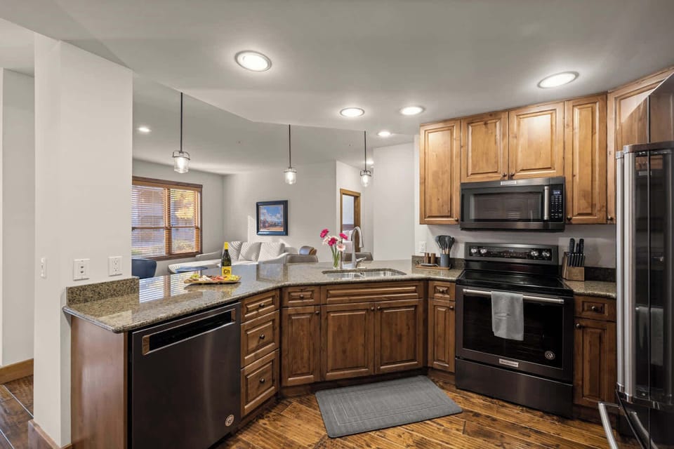 Enjoy making snacks and prepping meals in this modern kitchen