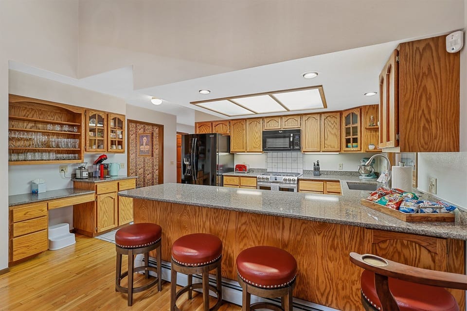 Fully Equipped Kitchen: Granite countertops, modern appliances, and essentials like a Nespresso coffee maker, toaster, and mixer make meal prep a breeze.