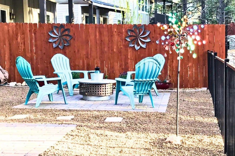 Forest Views & Outdoor Charm: Enjoy peaceful mornings or cozy nights by the firepit, surrounded by stunning pine trees directly in your backyard.