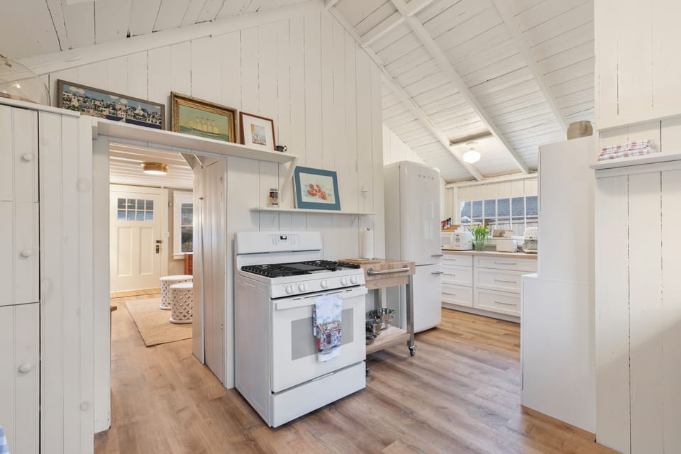 Gas stove in kitchen & Smeg refrigerator