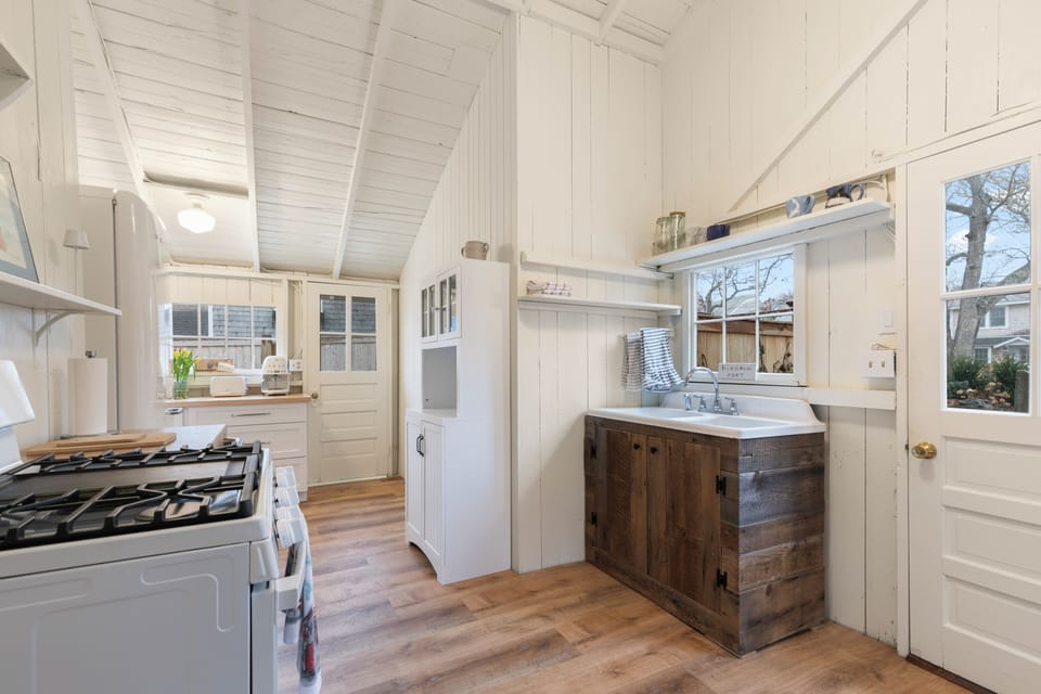 Kitchen with view of sink and pantry