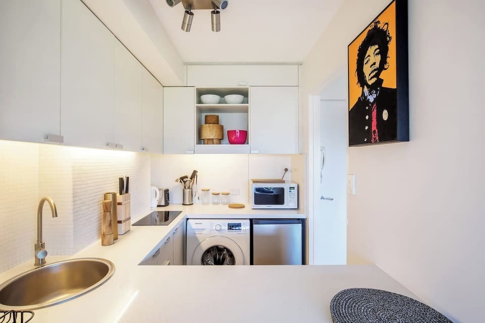 Modern fittings, ample bench space and pots, pans cuterlery and crockery are provided for you to enjoy cooking your favourite meals at home. 