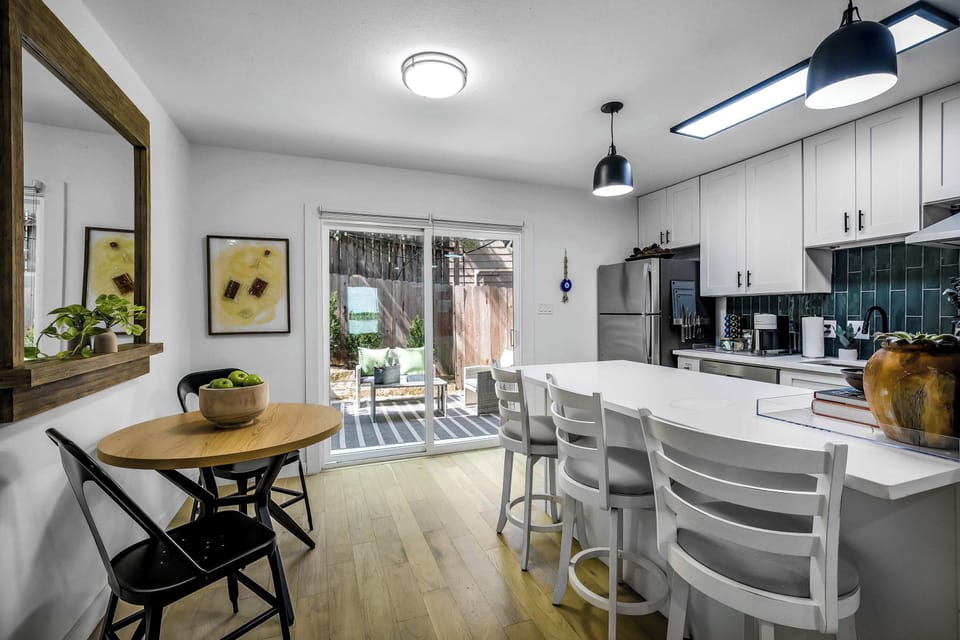 Comfortable kitchen table for dining and entertainment.