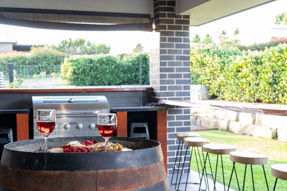 Let the family BBQ master work their magic on the grill while you sip a refreshing drink at the outdoor bar.