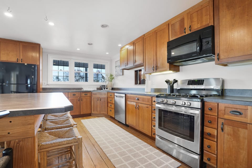 The first kitchen is smaller but stocked with useful kitchen items.